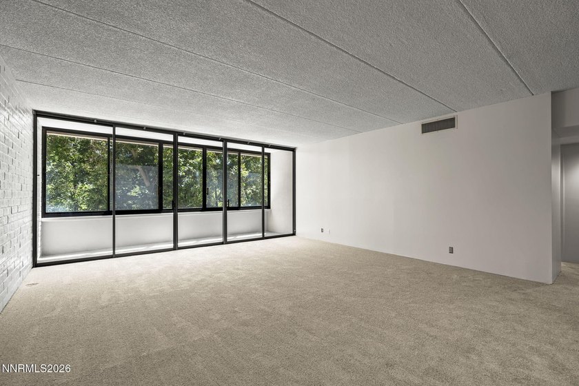 Elevated living along the Truckee River 4th-floor condo offering - photo 5