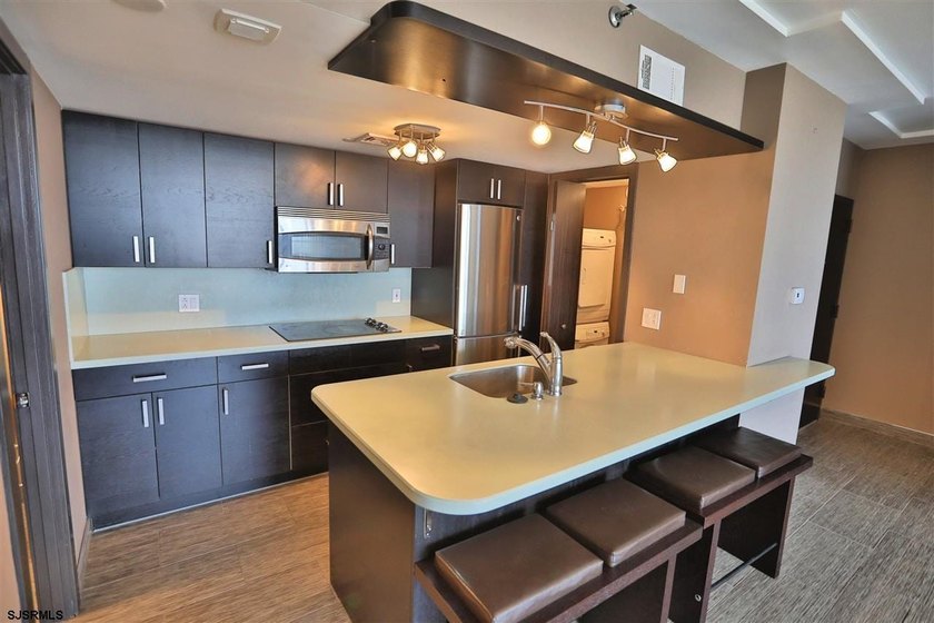 STUNNING!! One bedroom, 1.5 bath unit at the ENCLAVEPLETELY - photo 7