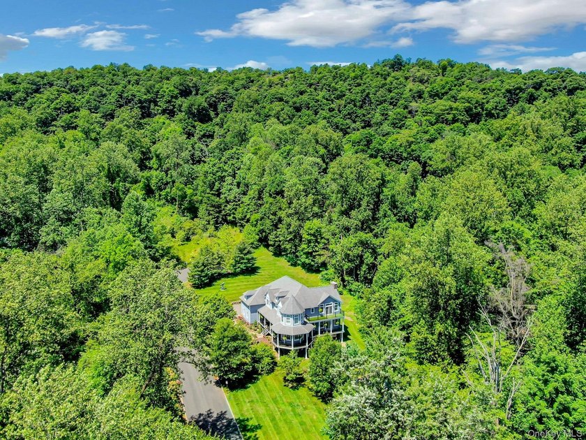 Nestled at the end of a private cul-de-sac in highly desirable - photo 4