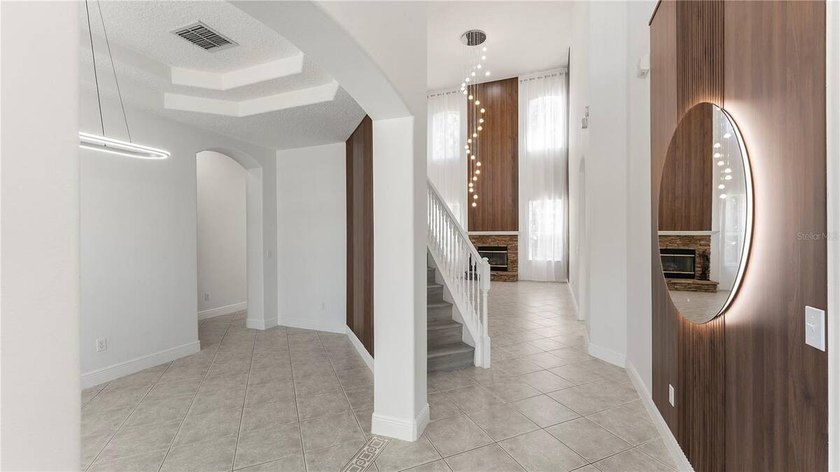 A beautiful, fully remodeled home featuring a new roof and new - photo 5