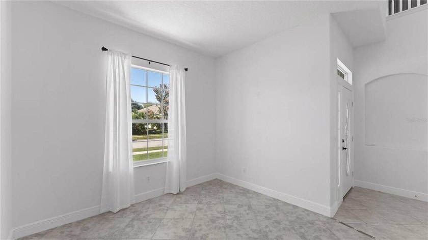 A beautiful, fully remodeled home featuring a new roof and new - photo 8