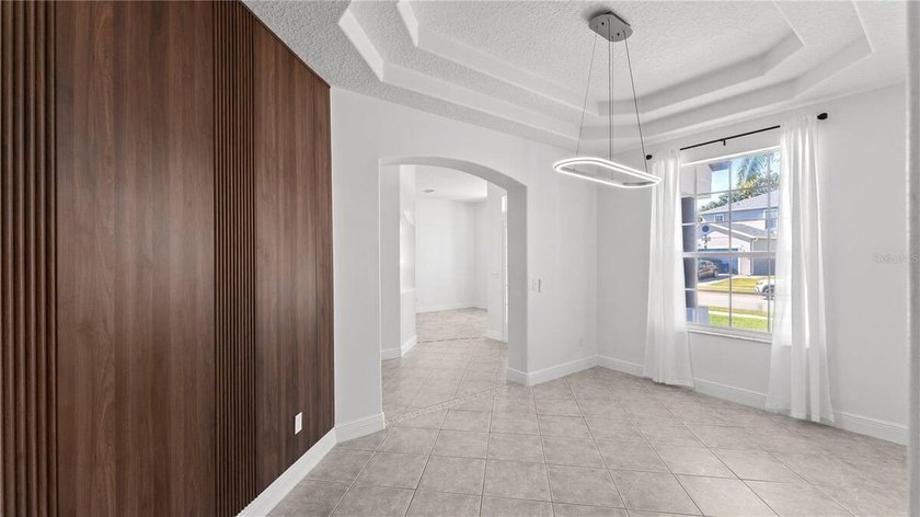 A beautiful, fully remodeled home featuring a new roof and new - photo 9