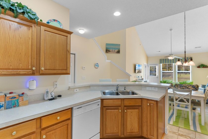 This beautifully maintained 3-bedroom, 2.5-bath condo in the - photo 3