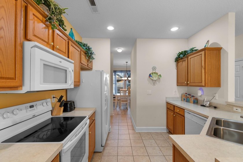 This beautifully maintained 3-bedroom, 2.5-bath condo in the - photo 6