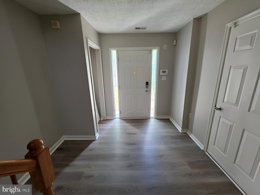 This end unit townhouse features a loft that provides flexible - photo 3