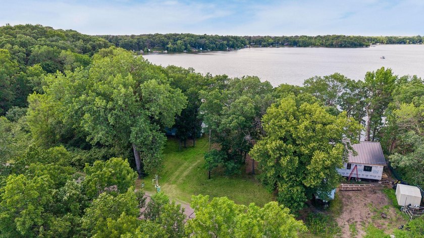 Discover a rare opportunity to own nearly an acre on Lake Julia - photo 7