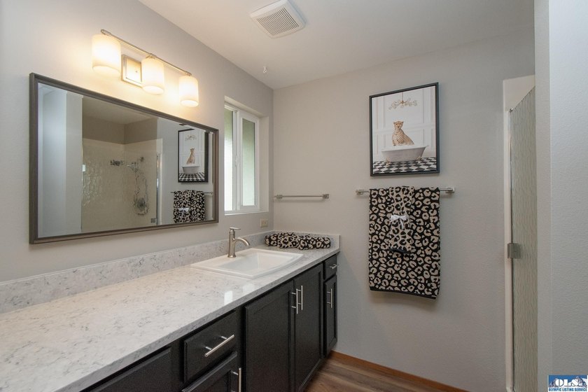 Move right into this beautifully remodeled 3 BR, 2 BA rambler - photo 19