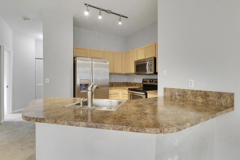 Come see this 3-bedroom, 2 bath, 1-car garage corner unit in one - photo 11