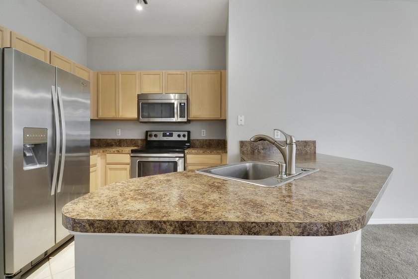 Come see this 3-bedroom, 2 bath, 1-car garage corner unit in one - photo 14