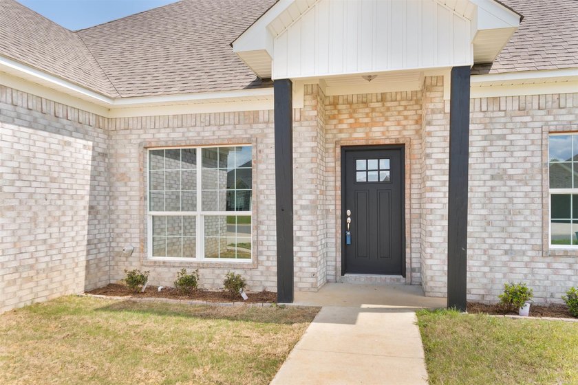 Beautiful new construction 4-bedroom, 2-bath brick home in the - photo 3