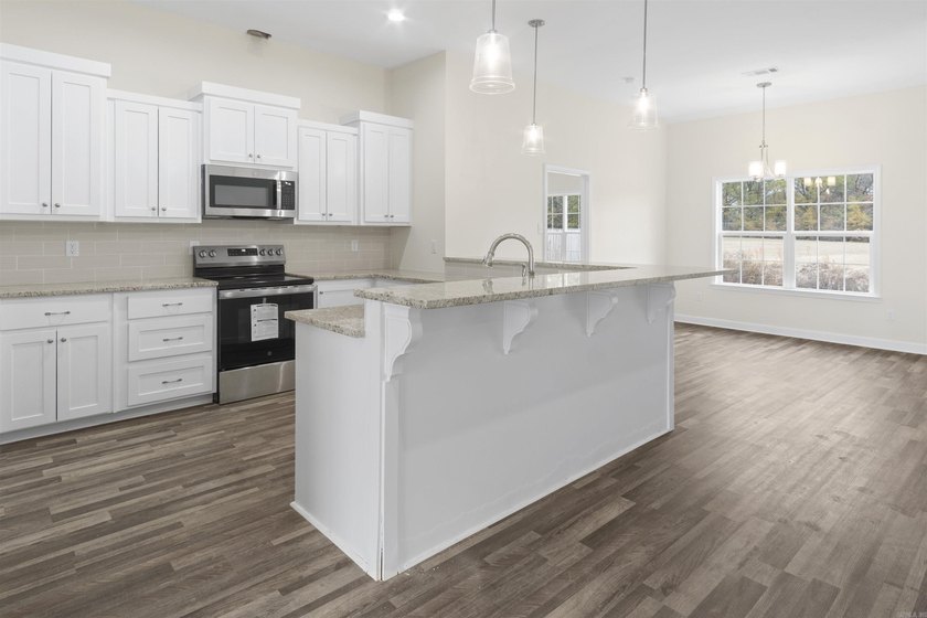 Beautiful new construction 4-bedroom, 2-bath brick home in the - photo 5