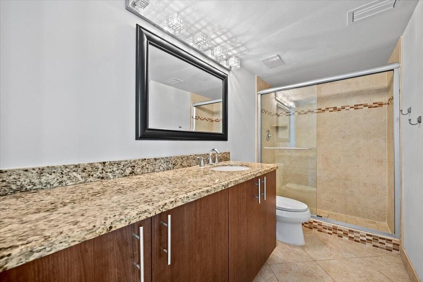 Enjoy beachfront living at its finest in this fully furnished - photo 17