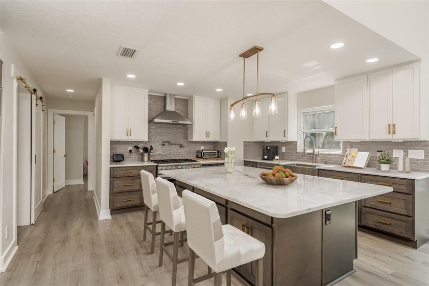 Privacy prevails on this custom home nestled on over an acre of - photo 9