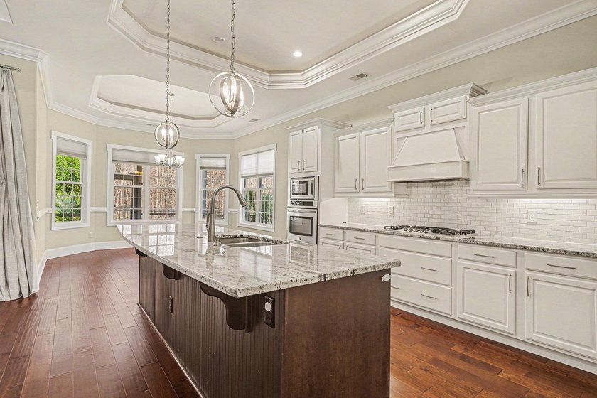 Discover your dream home in The Bluffs on the Waterway, a - photo 5