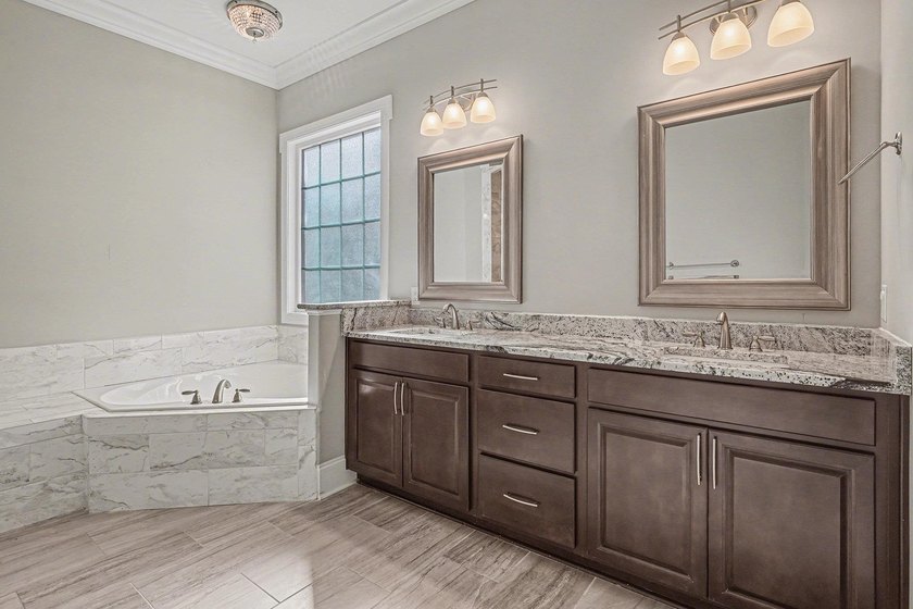 Discover your dream home in The Bluffs on the Waterway, a - photo 9