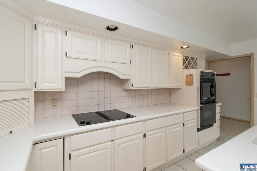 One level, 3 bedroom, 2 bath home with a den, located on the - photo 14