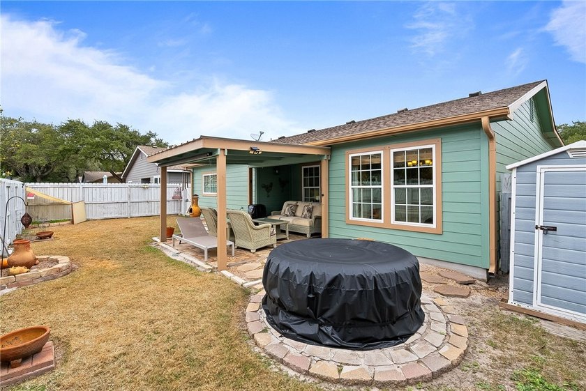 BOAT GARAGE | COVERED PATIO This beautifully maintained - photo 18