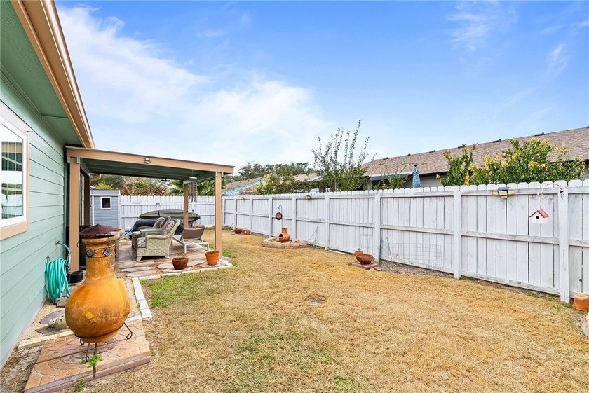 BOAT GARAGE | COVERED PATIO This beautifully maintained - photo 20