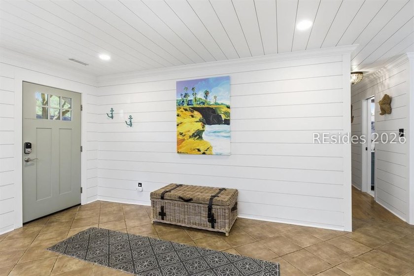 Nestled just steps from the ocean, this charming beach cottage - photo 10