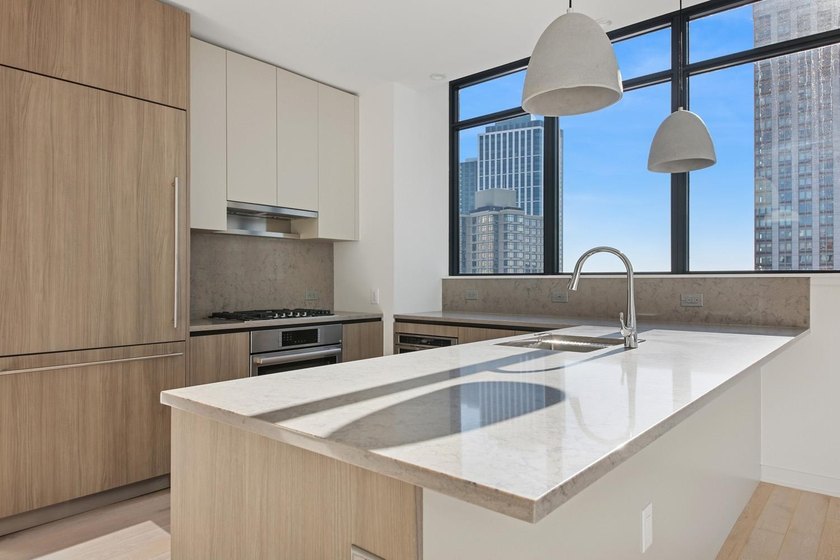 Residence 3307 is a penthouse-level 2-bedroom, 2-bath home at - photo 5