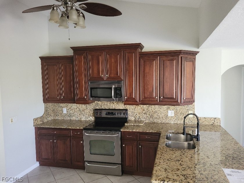 Welcome to this exceptional 3-bedroom, 2.5-bath pool home - photo 3