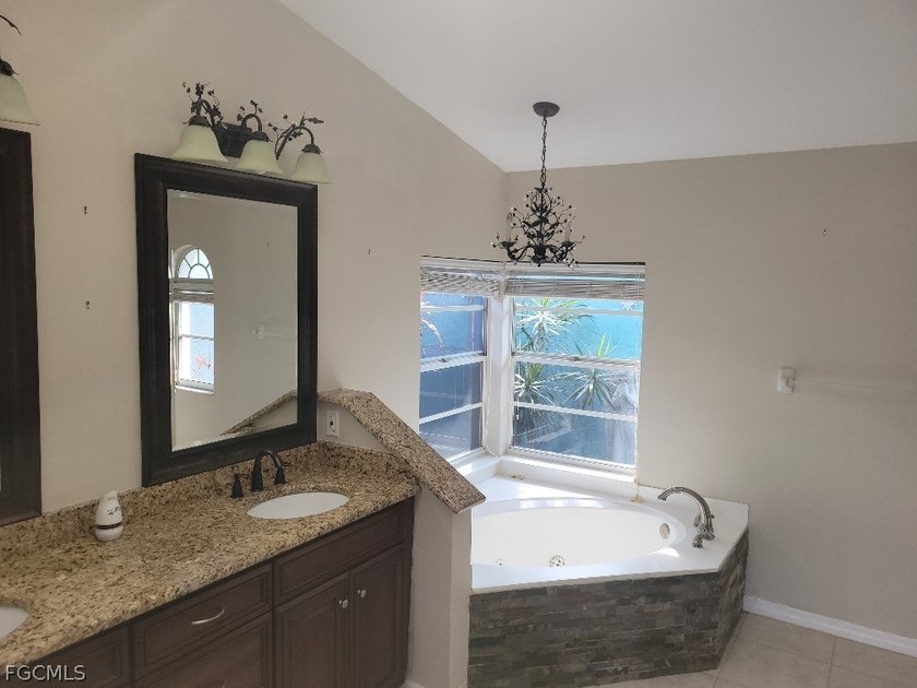 Welcome to this exceptional 3-bedroom, 2.5-bath pool home - photo 9