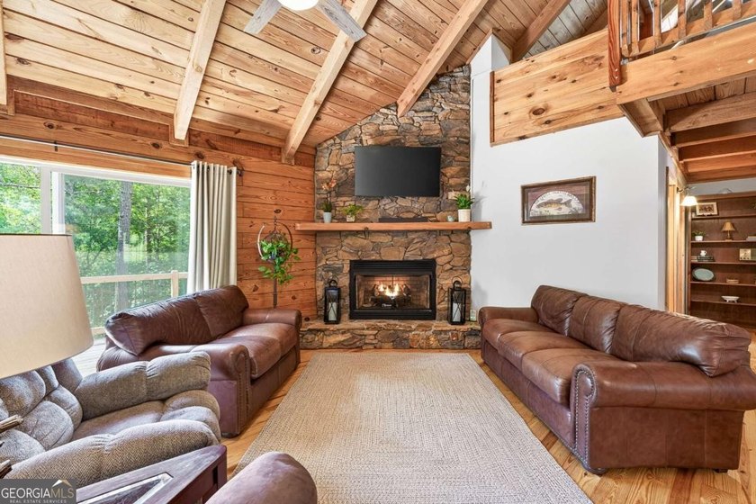 Fully furnished true log home on 5.78 private wooded acres in - photo 13