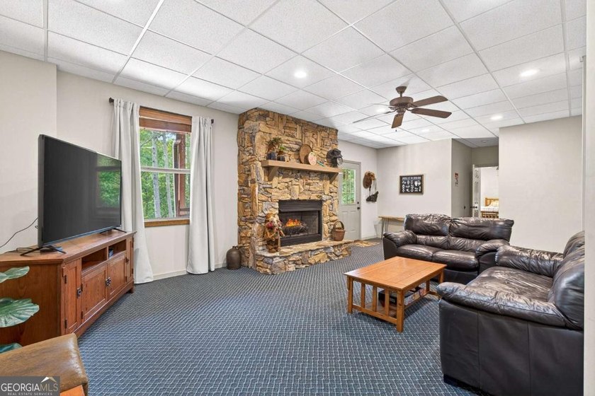 Fully furnished true log home on 5.78 private wooded acres in - photo 27