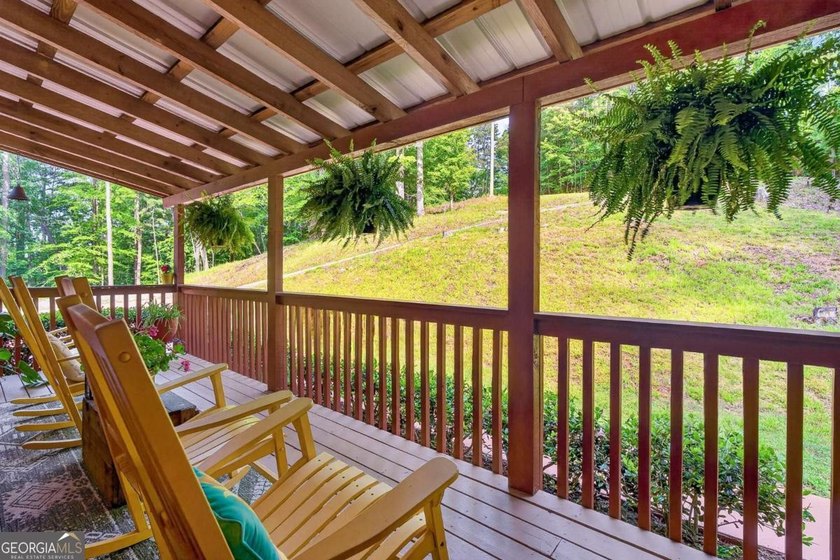 Fully furnished true log home on 5.78 private wooded acres in - photo 36