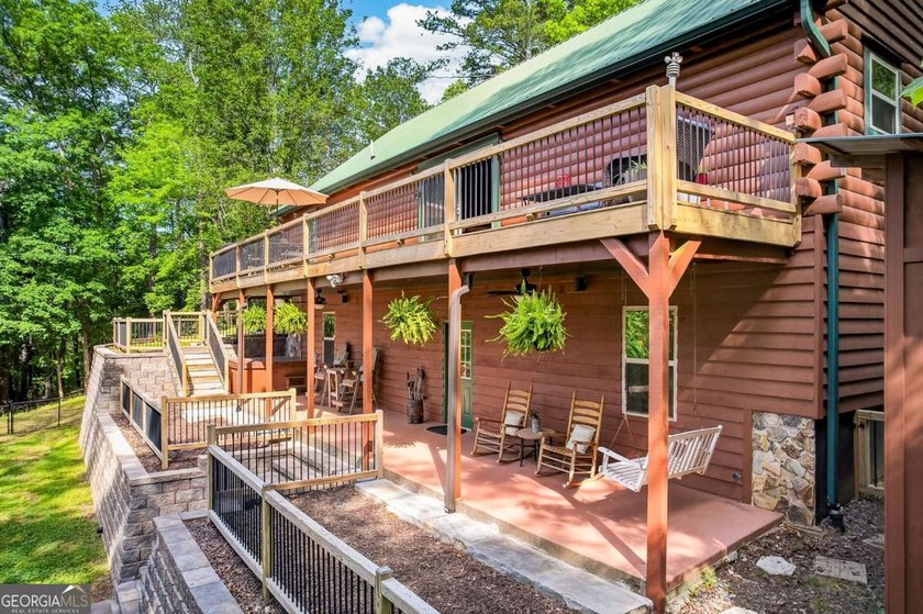 Fully furnished true log home on 5.78 private wooded acres in - photo 43