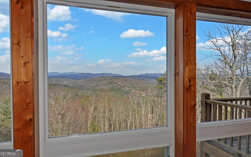 Step into this 3-bedroom, 3.5-bath mountain retreat in scenic - photo 16