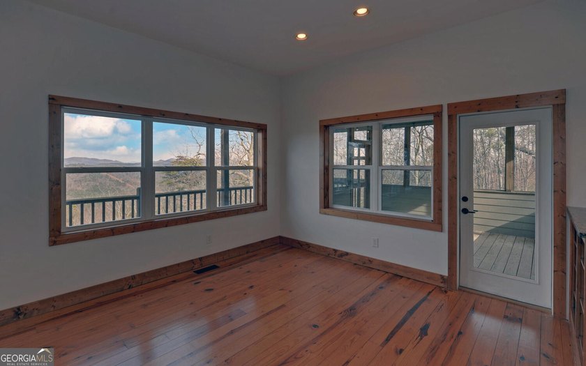 Step into this 3-bedroom, 3.5-bath mountain retreat in scenic - photo 17