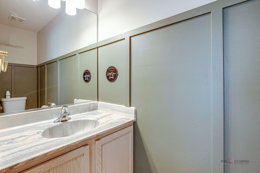 Welcome home to this beautifully updated 3-bedroom, 2.5-bath - photo 18