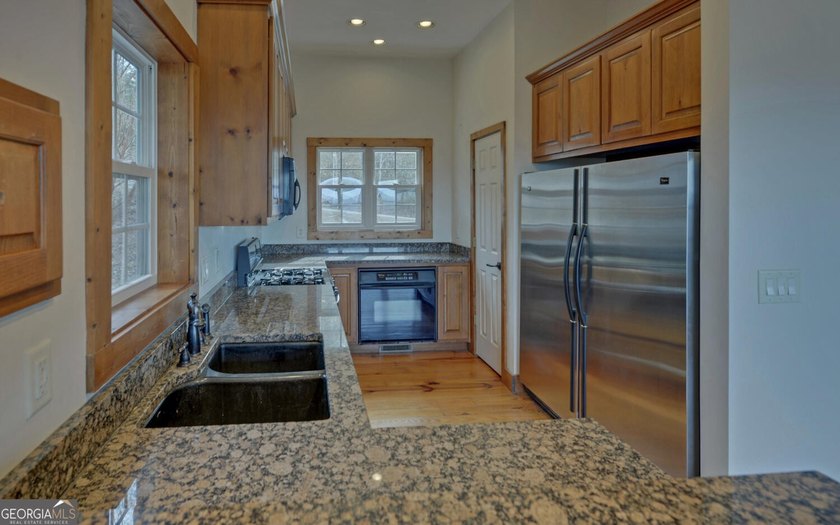 Step into this 3-bedroom, 3.5-bath mountain retreat in scenic - photo 20
