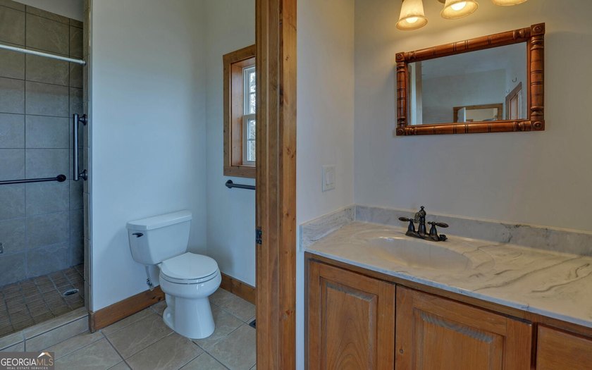 Step into this 3-bedroom, 3.5-bath mountain retreat in scenic - photo 25