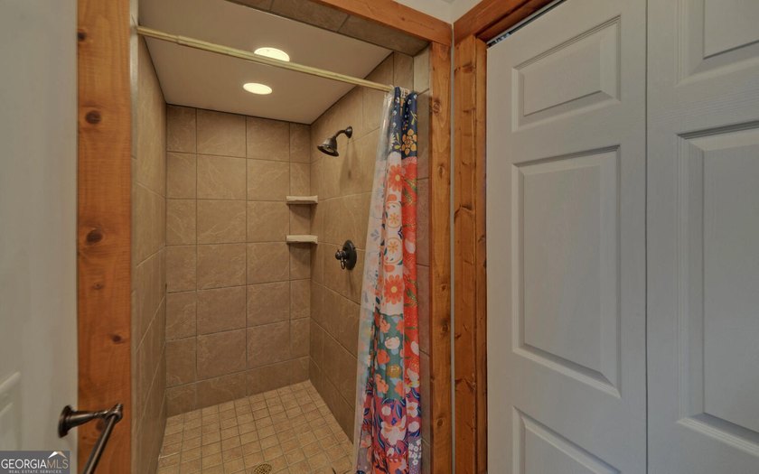 Step into this 3-bedroom, 3.5-bath mountain retreat in scenic - photo 56