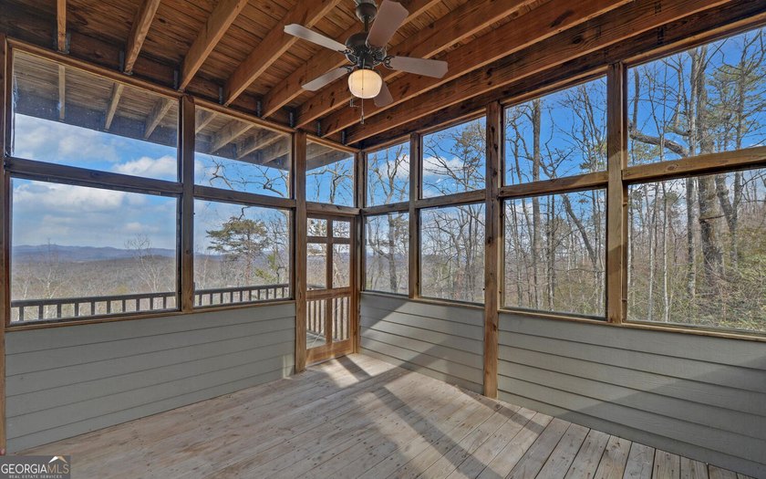 Step into this 3-bedroom, 3.5-bath mountain retreat in scenic - photo 58