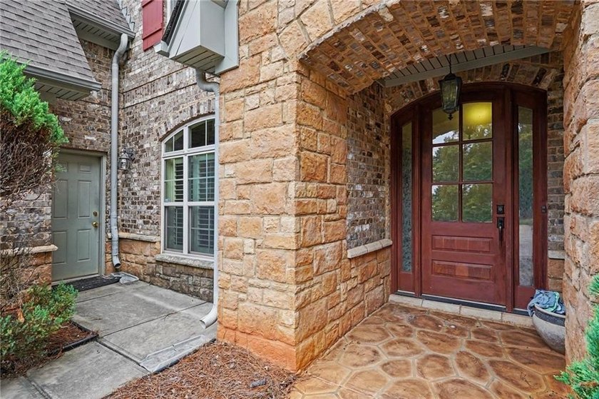 Welcome to this custom built, 4 sides brick home with stone - photo 3