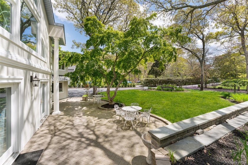 Set 150 feet off the road behind private gates, this beautifully - photo 38