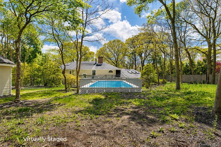 Set 150 feet off the road behind private gates, this beautifully - photo 44