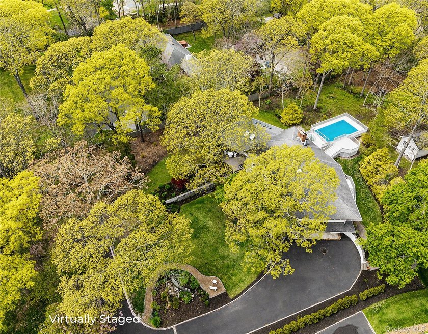 Set 150 feet off the road behind private gates, this beautifully - photo 48