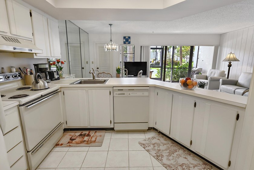 Own a slice of paradise in the highly desirable Tennis Villas at - photo 11