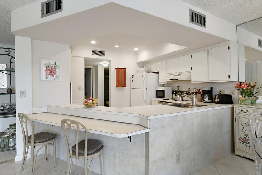 Own a slice of paradise in the highly desirable Tennis Villas at - photo 15