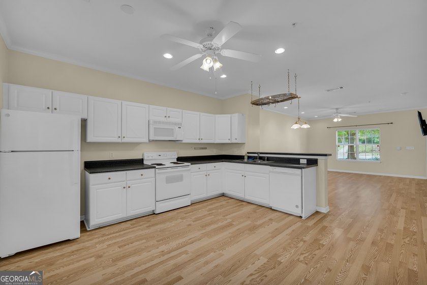 Move-in ready and perfectly located! This well-maintained - photo 10
