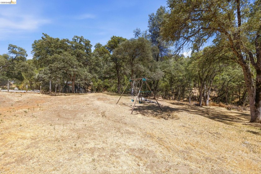 CHARMING SINGLE-LEVEL RANCH HOME ON OVER AN ACRE! Welcome to - photo 26