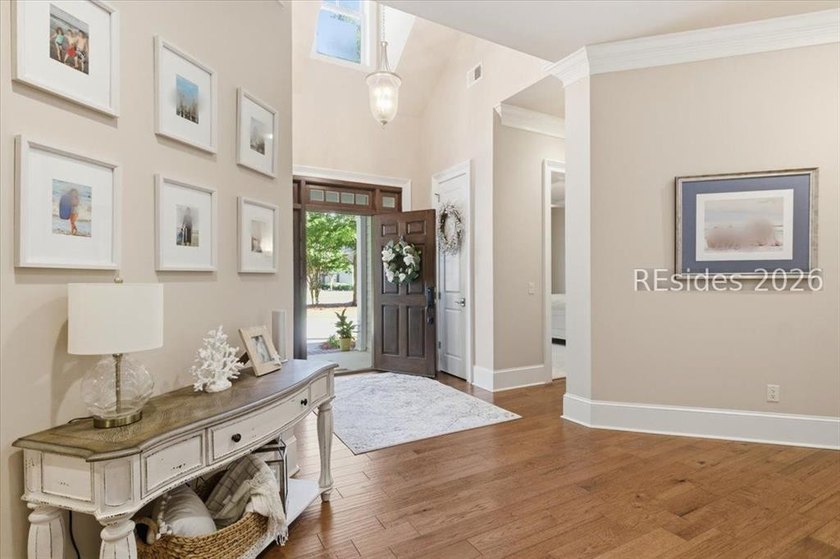 Hampton Lake is a gated community in Bluffton, centered around a - photo 6