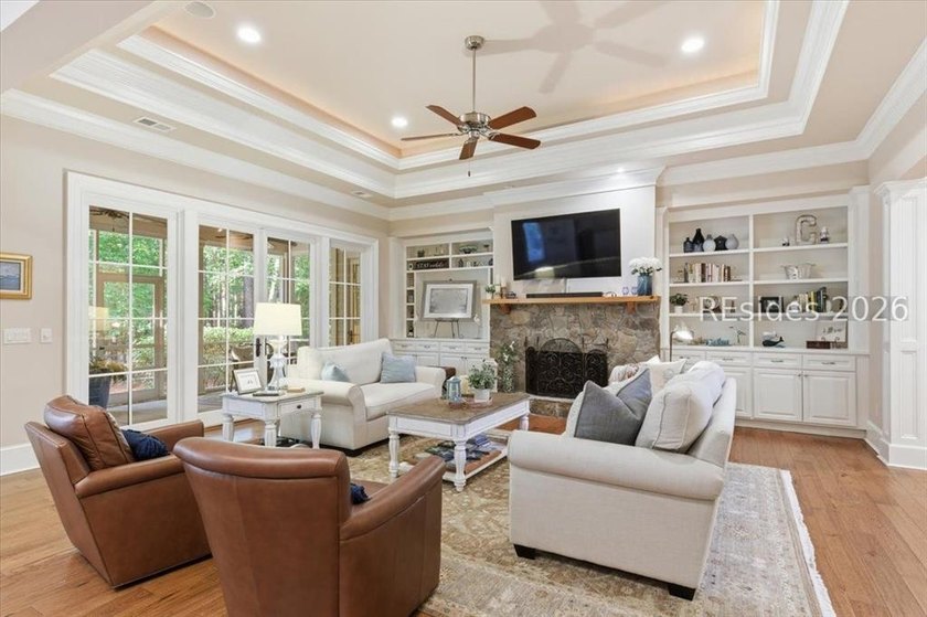 Hampton Lake is a gated community in Bluffton, centered around a - photo 10