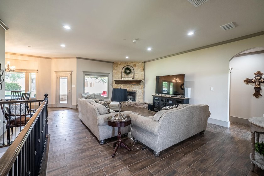 Experience luxury acreage living in Highland Oaks! Situated on a - photo 6