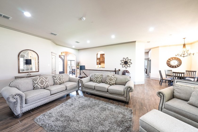 Experience luxury acreage living in Highland Oaks! Situated on a - photo 7