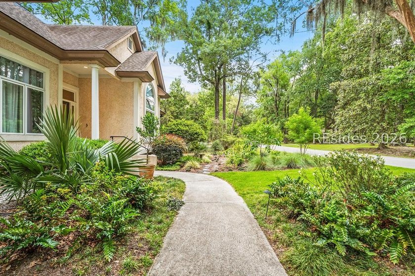 Nestled on a private circle within the prestigious Callawassie - photo 7